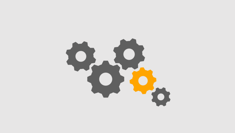 Zahnräder auf grauem Hintergrund