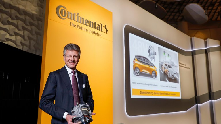Continental CEO Dr. Elmar Degenhart with electric motor